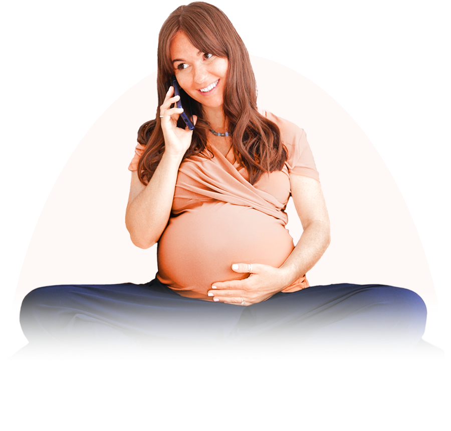 Expectant mother smiling while talking on the phone, exemplifying the supportive care and guidance provided by London Pregnancy Clinic